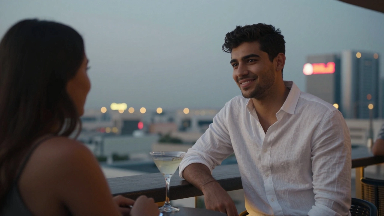 A young man and client enjoying the Dubai skyline from a quiet rooftop bar at twilight.